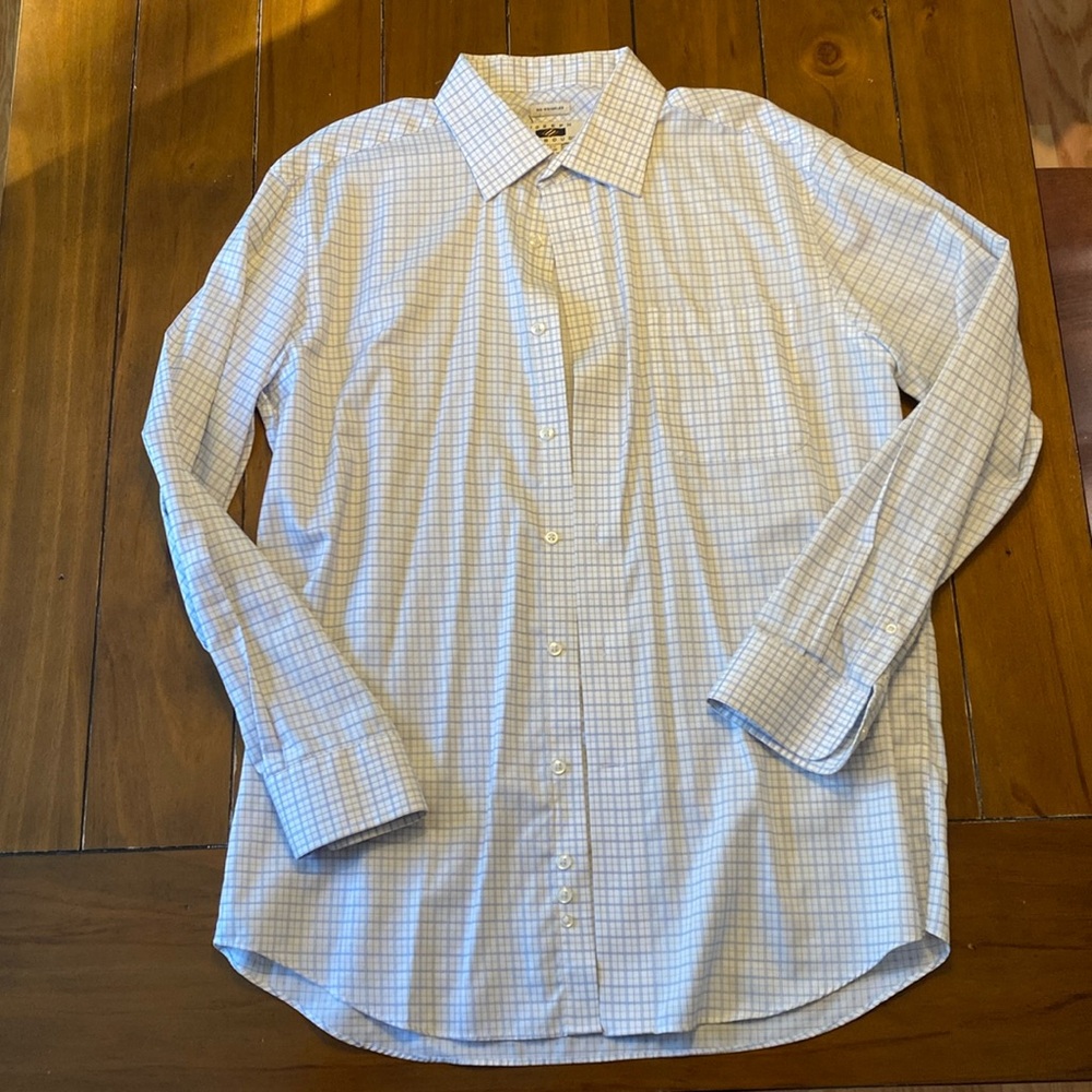100% cotton men’s dress shirt. White with blue plaid. Wrinkle resistant.